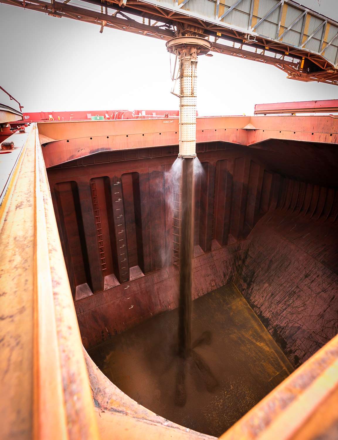 Iron ore loading into a ship