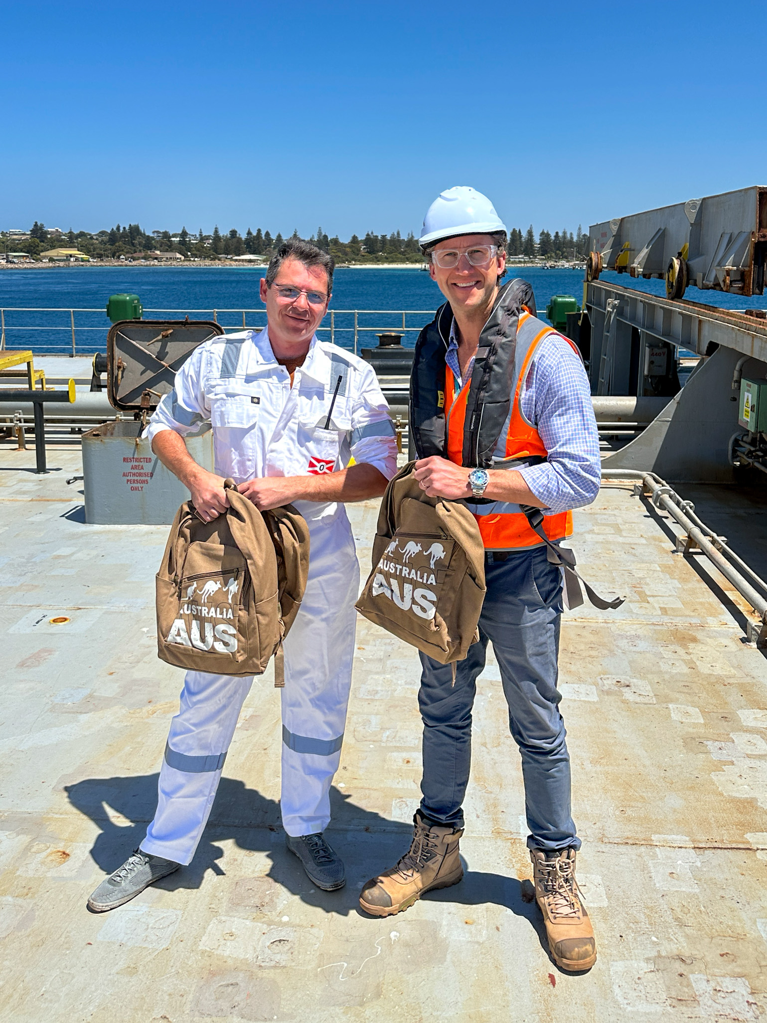 Ships Captain with Southern Ports representative holding gift hampers