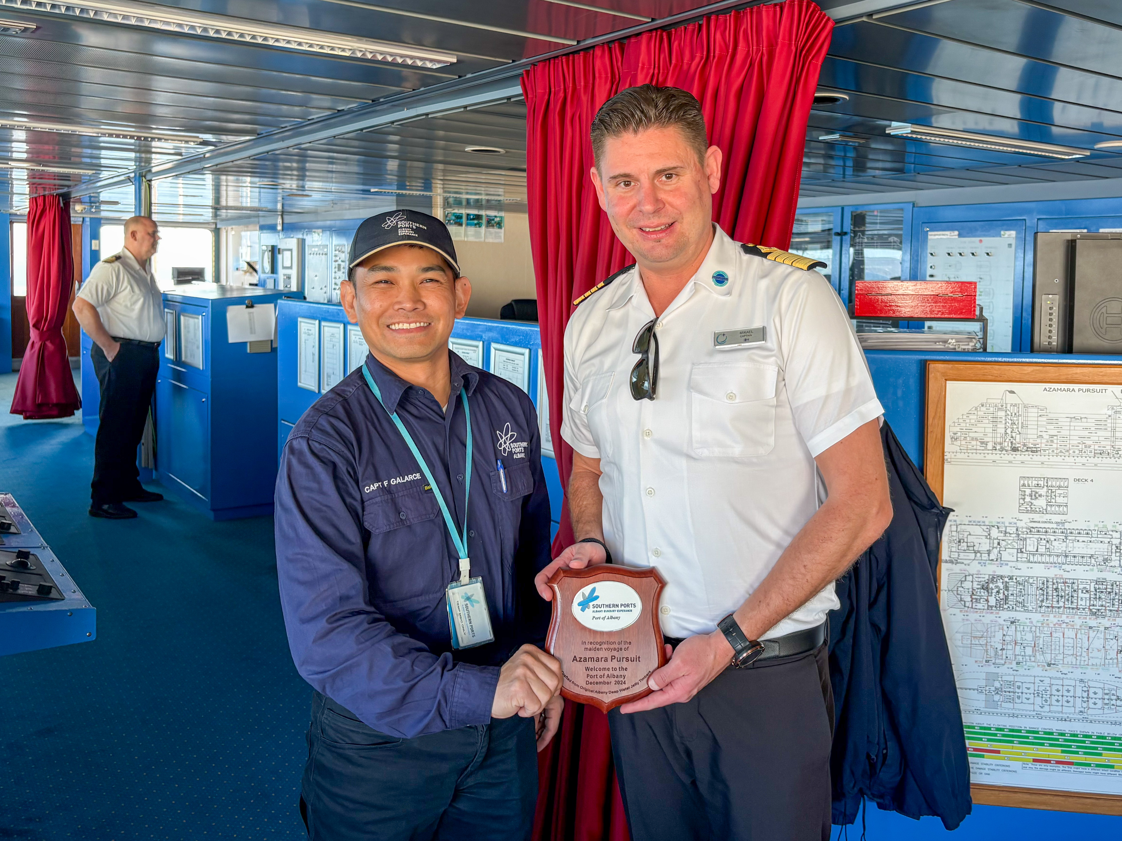 Southern Ports Marine Pilot Captain Francis Galarce presented Azamara Pursuit Captain Mikael Palmroos a plaque when then vessel made its maiden call at the Port of Albany in December.